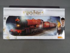 Hornby - an OO gauge boxed train set, Harry Potter, Hogwarts Express comprising locomotive,coaches,