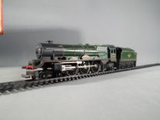 Hornby - an OO gauge 4-6-2 locomotive and tender class 8P, op no 46201 Princess Elizabeth,