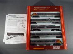 Hornby - an OO gauge boxed set, Advanced Passenger Train Pack comprising two driving trailers,