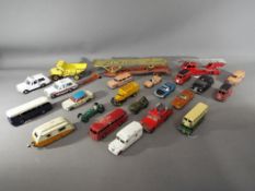 Dinky Toys - A group of 24 unboxed diecast model vehicles.