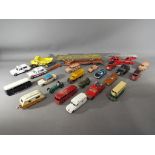 Dinky Toys - A group of 24 unboxed diecast model vehicles.