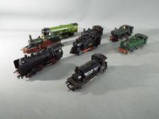 Eight unboxed OO gauge locomotives comprising Triang, Hornby, Jouef and similar, condition varies.