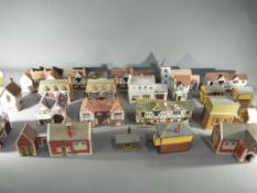 A collection of OO gauge model railway scenics buildings.