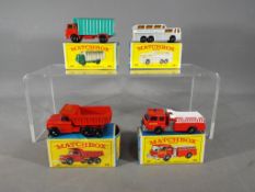 Matchbox, Lesney - Four boxed Matchbox model vehicles.