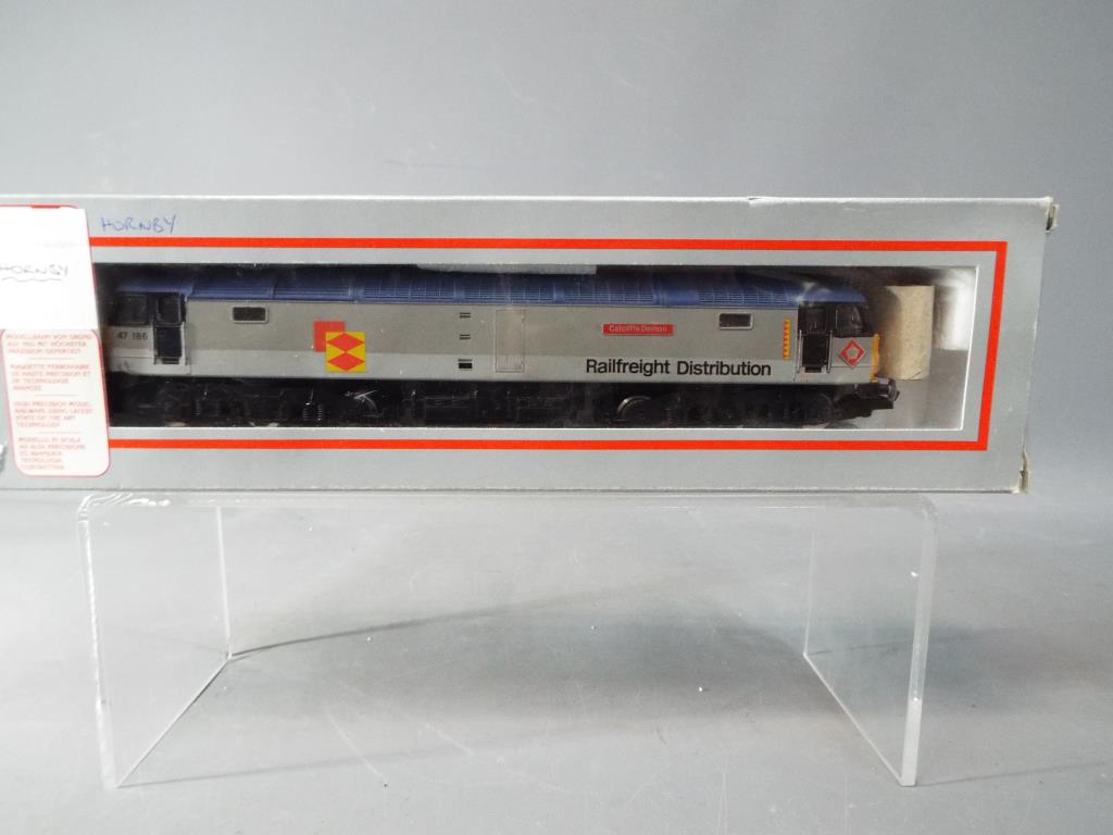 Hornby - an OO gauge Railfreight class 47 diesel electric locomotive, op no 47186 Catcliffe Demon,