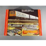 Hornby - an OO gauge boxed set, BR three-car diesel multiple unit pack,