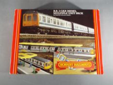 Hornby - an OO gauge boxed set, BR three-car diesel multiple unit pack,