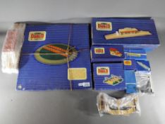 Hornby Dublo - a quantity of OO gauge scenics to include through station, signal cabin,