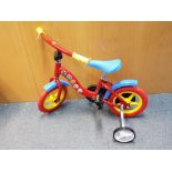 Dino - An unboxed Dino 12" inch frame Paw Patrol childrens bicycle.