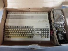 Commodore - A boxed Commodore Amiga 500 personal computer.