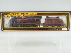 Mainline Railways - an OO gauge Jubilee class 4-6-0 locomotive and tender, LMS crimson livery,
