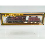 Mainline Railways - an OO gauge Jubilee class 4-6-0 locomotive and tender, LMS crimson livery,