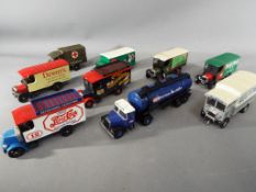 Corgi - Nine unboxed vehicles by Corgi to include Ever Ready Batteries Tanker, Army Ambulance,