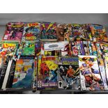 A collection of DC and Marvel comics to include Cage, The Mighty Thor, The defenders, Superman,