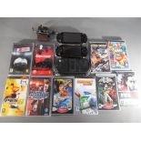Playstation - Two Sony PSP hand held portable game consoles,