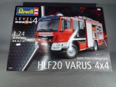Revell - a 1:24 scale boxed kit, MAN TGM/Schlingmann HLF20 Varus 4x4 fire tender, level 4 # 07452,