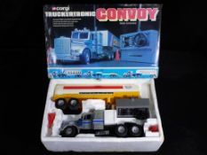 Corgi - A boxed Corgi M5600 Convoy Truckertronic battery operated remote control Truck.