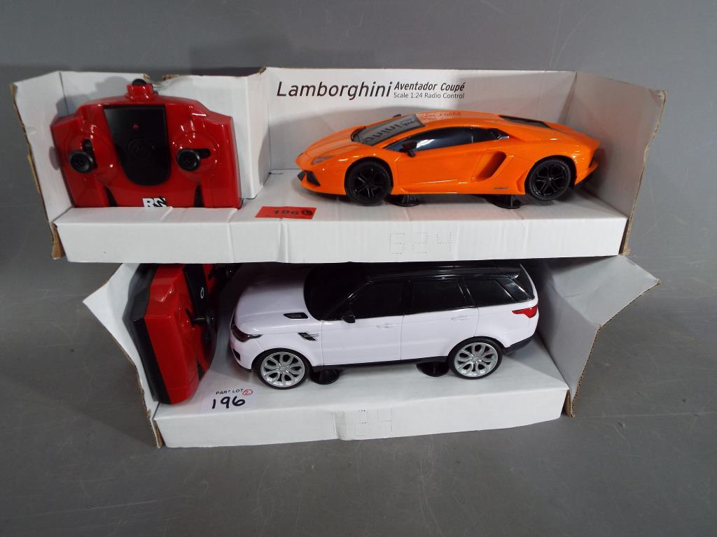 Two remote controlled 1:24 scale models,