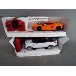 Two remote controlled 1:24 scale models,