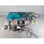 Nintendo - A Nintendo N64 games console, two controllers,