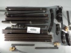 Hornby, Triang - A large quantity of unboxed Hornby / Triang OO Gauge railway track and points.