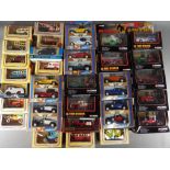 A quantity of boxed diecast model vehicles to include Days Gone, Corgi, Vanguards and similar.