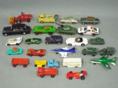 Corgi, Dinky, Matchbox - In excess of 20 unboxed diecast model vehicles in various scales.