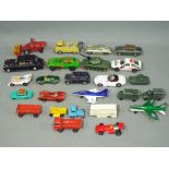 Corgi, Dinky, Matchbox - In excess of 20 unboxed diecast model vehicles in various scales.