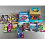 Colouring Books, Ty Beanies, Shopkins and Others - A collection of retail stock toys and games.