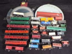 Hornby, Triang - 30 pieces of unboxed OO gauge freight and passenger rolling stock,