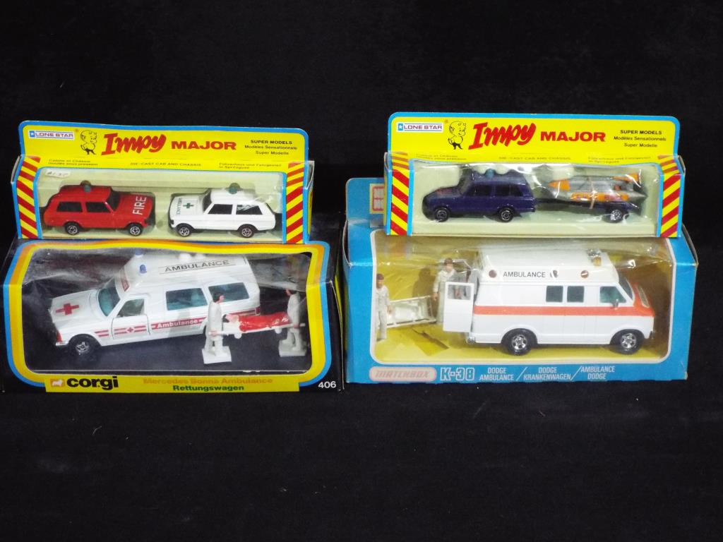 Corgi, Matchbox, Lone Star - Four boxed diecast model vehicles.