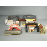 A small collection of OO Gauge railway plastic and cardboard layout buildings and accessories