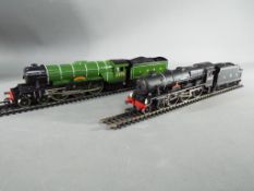 Hornby - two OO gauge model locomotives comprising 4-6-2 Flying Scotsman with tender op no 4472,