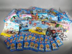 Lego - 21 sealed Lego packs to include Lego City, Lego Disney Princess, The Lego Movie and similar,