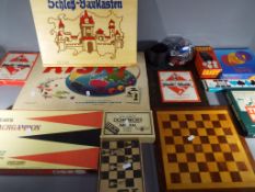 A quantity of vintage games to include Backgammon, Risk, Scrabble, Monopoly, Chess, Dominoes,