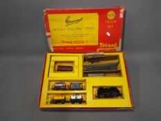Triang - A boxed Triang 'Gamages' RGX Electric Train Set. The set contains a 0-6-0 Tank engine Op.