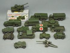 Dinky Toys - A collection of 16 predominately unboxed diecast military vehicles.
