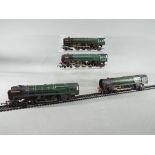 Four unboxed OO gauge steam locomotives to include two Triang R259 'Britannia' and two similar.