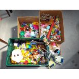 A large collection of predominately plastic childrens toy figures with an unboxed Marx Wombles