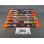 Matchbox Mattel Wheels - seven sealed tubes containing five model motor vehicles,