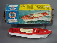 A Scalex electric Speed Boat # 415S, battery oerated, boxed,