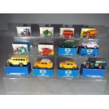 Six various boxed reproduction Matchbox vehicles and four boxed 'Fina Classic Motors' models by