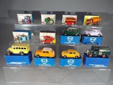 Six various boxed reproduction Matchbox vehicles and four boxed 'Fina Classic Motors' models by