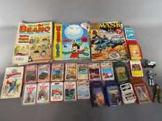 A collection of vintage comics to include Beezer, Whizzer and Chips, Topper, Beano,