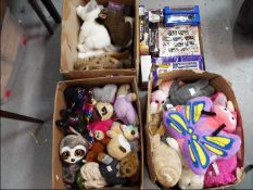 A large collection of childrens soft toys with some boxed diecast vehicles (4)