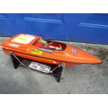 A glass fibre hulled model power boat, with internal motor, SHG Marine,