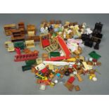 Sylvanian Families, Tomy - A large quantity of unboxed Sylvanian Family figures and accessories.