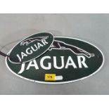 Two cast iron Jaguar wall plaques (yjag2)
