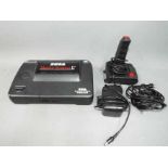 Sega - An unboxed Sega Master System II games console with power cable and joystick.