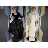 Two Franklin Mint Princess Diana porcelain collectors dolls contained in original boxes.